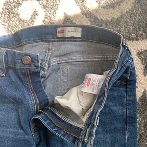 Means work jeans hole by knee  thick